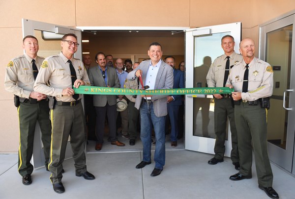 Kings County Sheriff David Robinson (left) with Assemblyman Rudy Salas at ribbon cutting for new headquarters.
